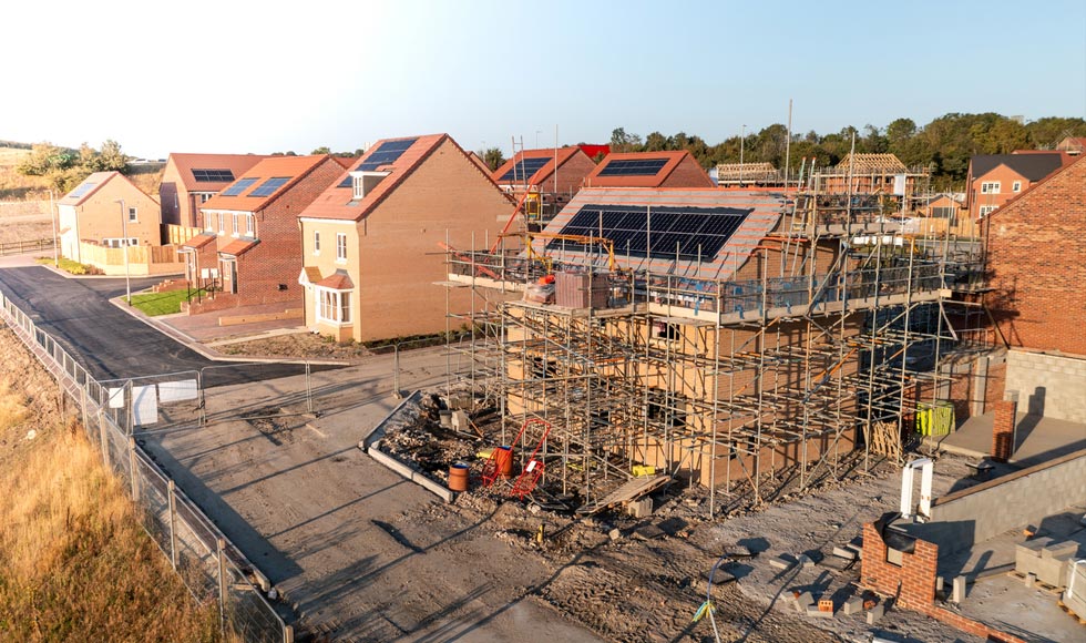 solar panels and heat pumps on all new builds uk